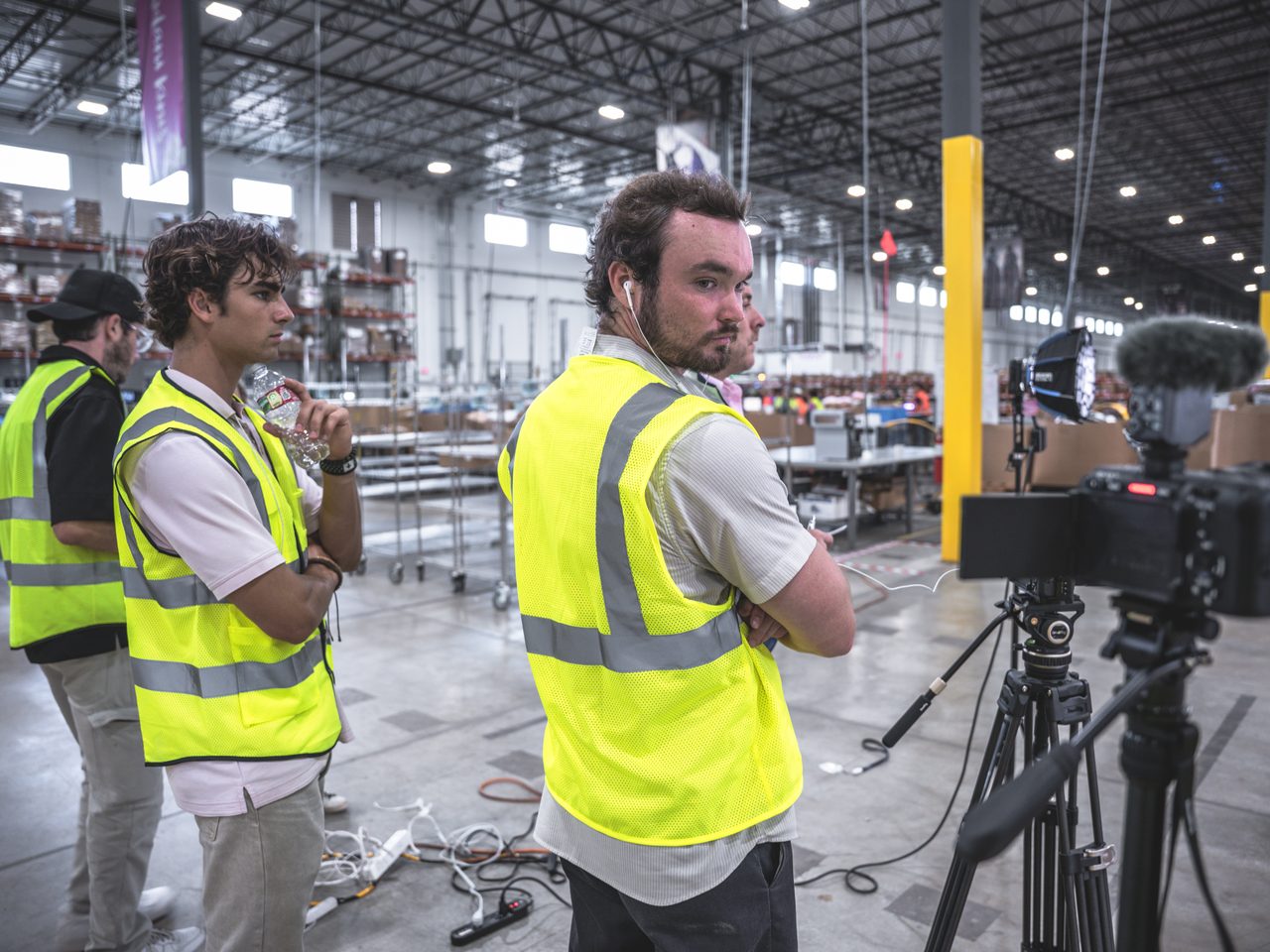 Crew setting up a shot inside a Forney, TX fulfillment warehouse